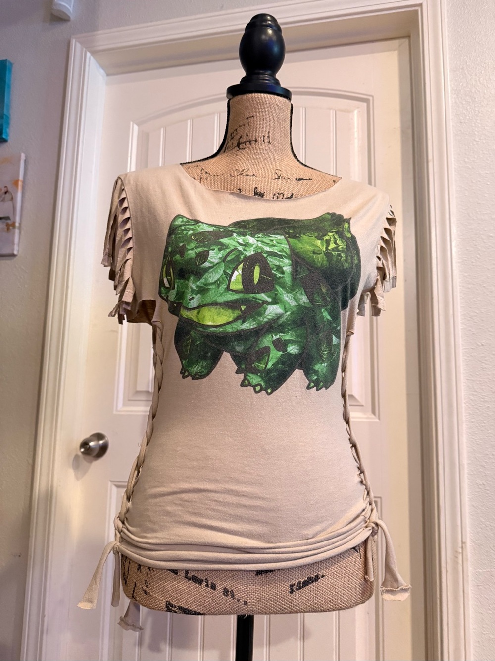 Women’s Beige Graphic Tee with Green Bulbasaur Artwork